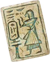 Photo of a bead plaque from the Metropolitan Museum of Art, with an engraving of Paser, Scribe of the granaries